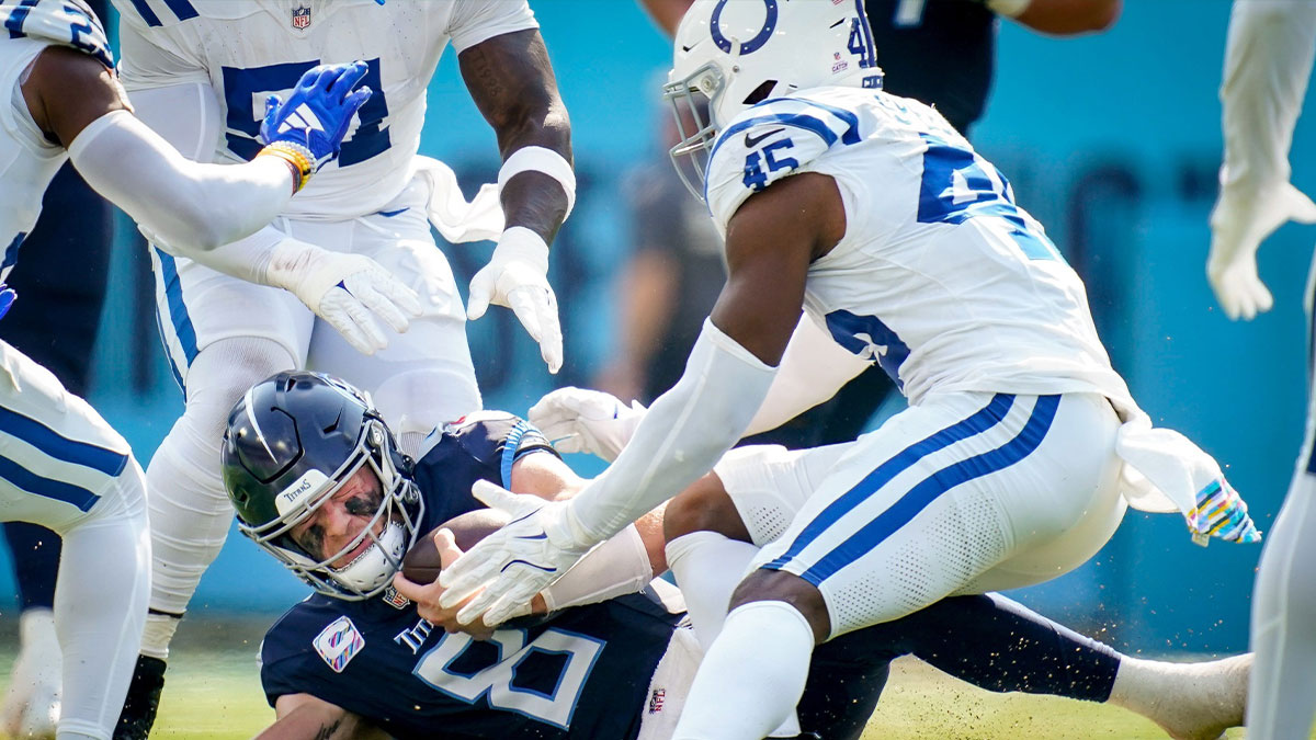 Tennessee Titans quarterback Will Levis (8) collides with Indianapolis Colts linebacker E.J. Speed (45) during the second quarter at Nissan Stadium in Nashville, Tenn., Sunday, Oct. 13, 2024.