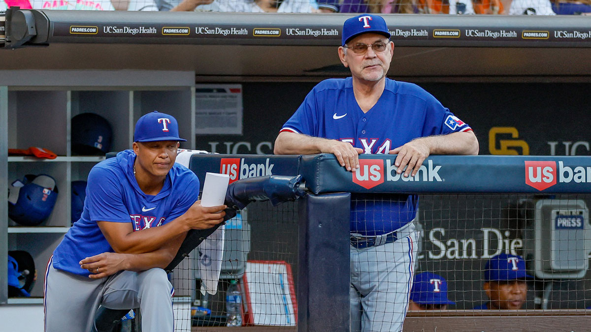 Texas Rangers manager Bruce Bochy (15) and associate manager Will Venable (83) watch on as San Diego Padres starting pitcher Yu Darvish (11) pitches during the fifth inning against the San Diego Padres at Petco Park.