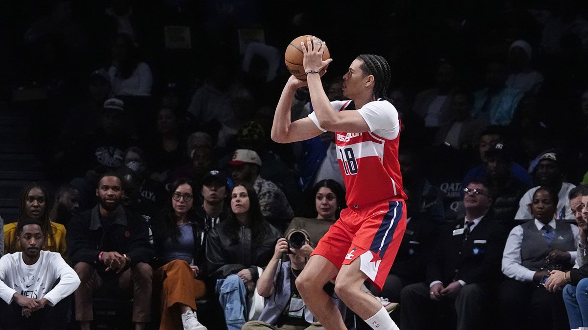 Washington Wizards forward Kyshawn George (18) shoots a three-point jump shot against the Brooklyn Nets during the first half at Barclays Center.