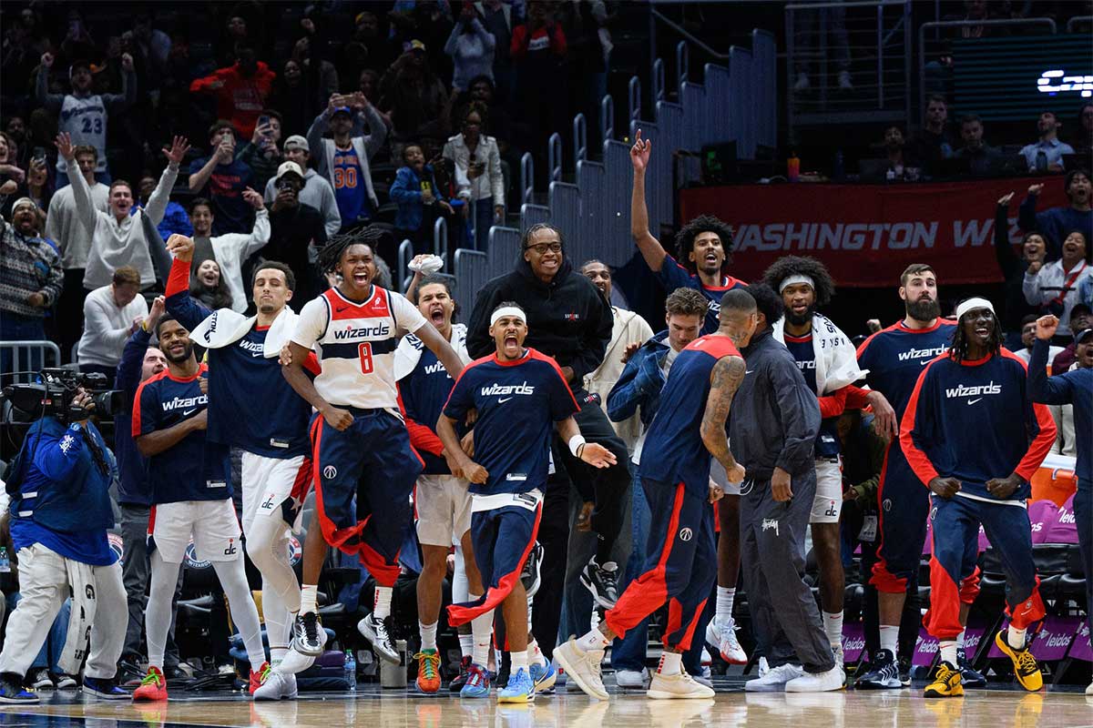 The Washington Wizards bench celebrates during the fourth quarter against the New York Knicks at Capital One Arena.