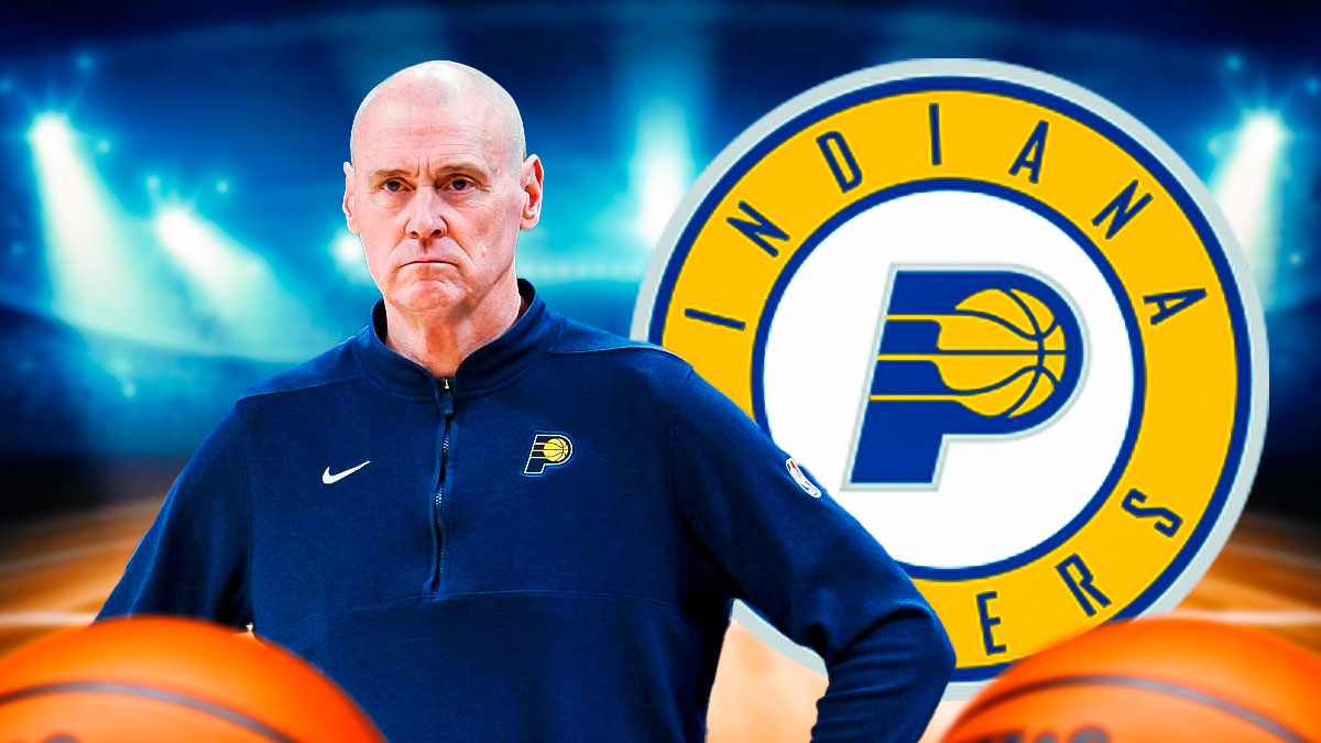 Pacers Rick Carlisle with Pacers logo