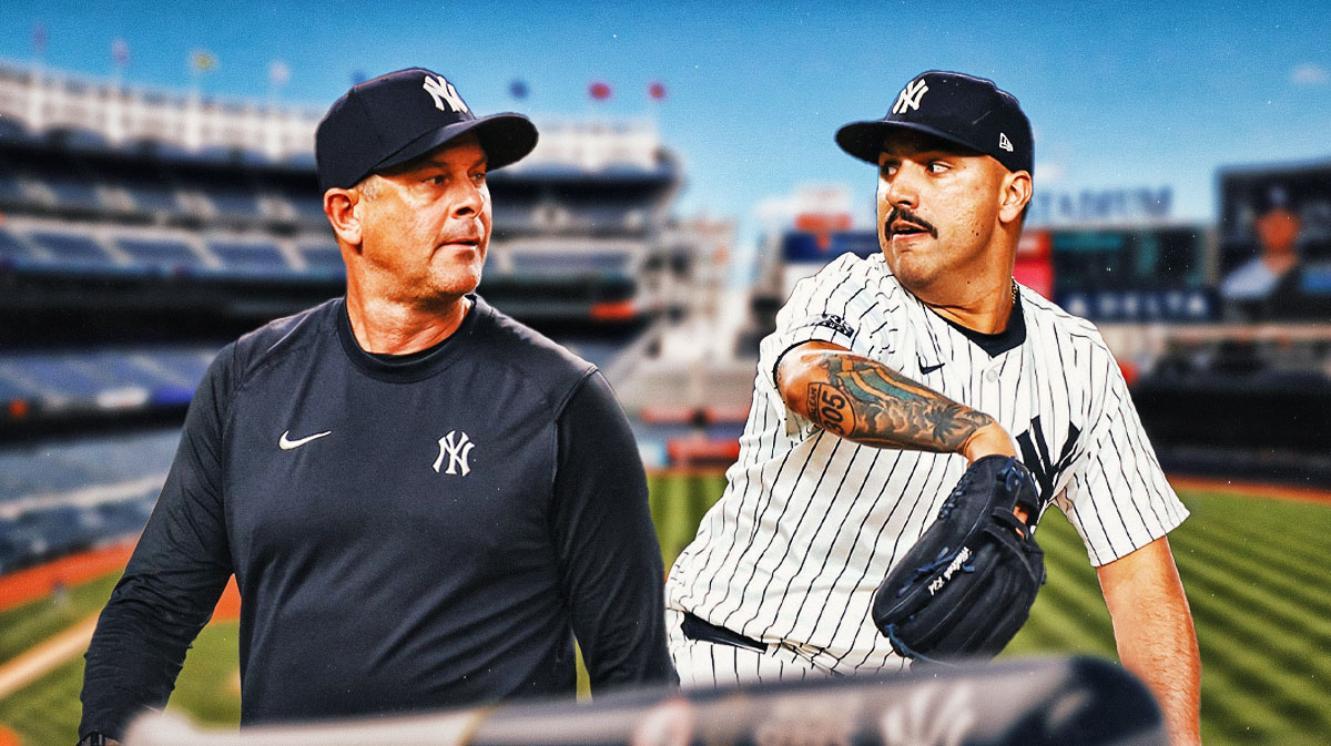 Photo: Nestor Cortes in action in Yankees jersey, Aaron Boone looking at him