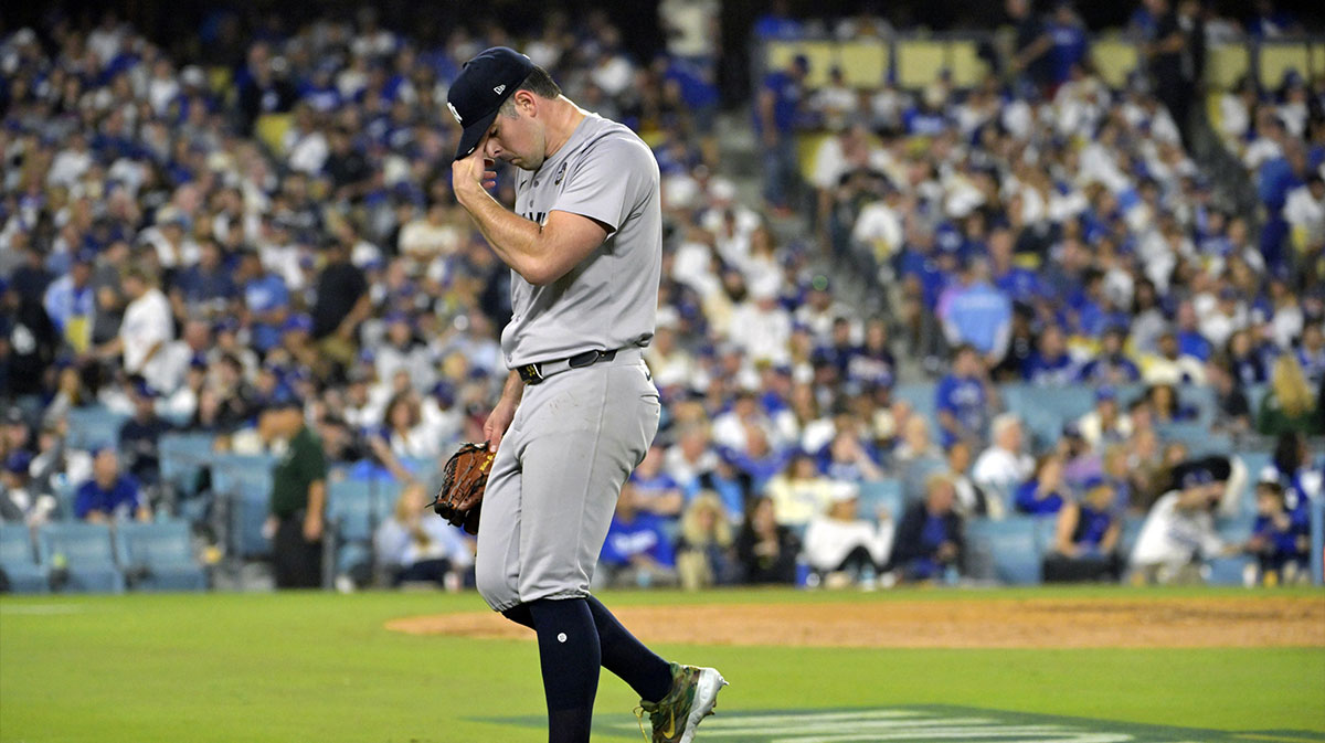 New York Yankees pitcher Carlos Rodon (55) reacts in the fourth inning against the Los Angeles Dodgers during game two of the 2024 MLB World Series at Dodger Stadium.