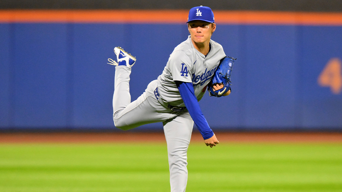 Los Angeles Dodgers pitcher Yoshinobu Yamamoto (18) practices against the New York Mets before game four for the NLCS for the 2024 MLB playoffs at Citi Field.