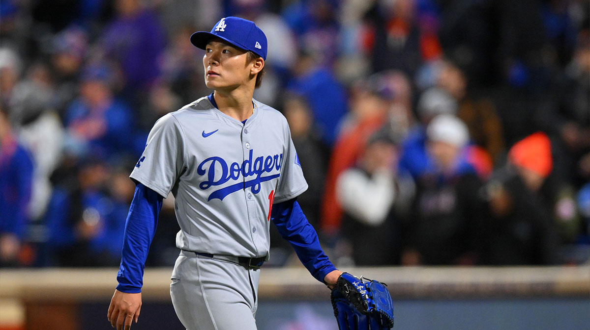 Los Angeles Dodgers pitcher Yoshinobu Yamamoto (18) reacts against the New York Mets in the third inning during game four of the NLCS for the 2024 MLB playoffs at Citi Field.
