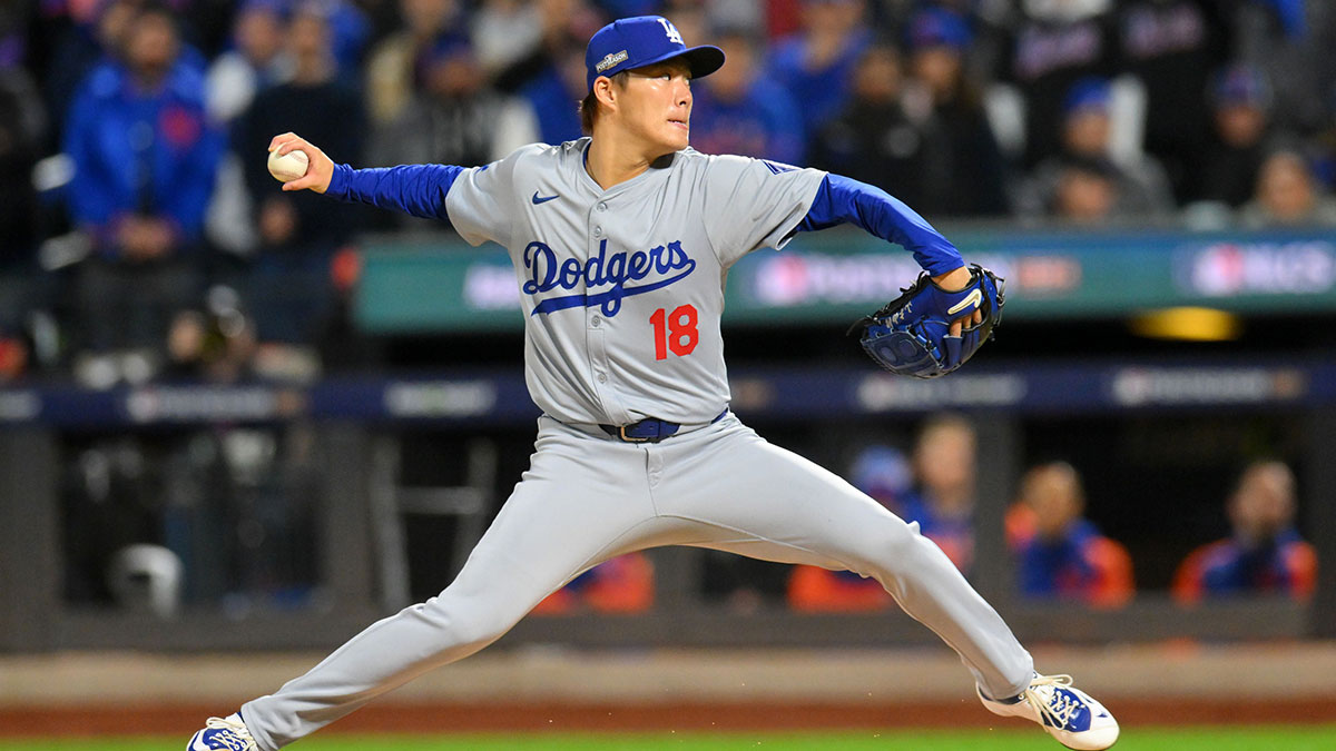 Los Angeles Dodgers pitcher Yoshinobu Yamamoto (18) throws a pitch against the New York Mets in the first inning during game four of the NLCS for the 2024 MLB playoffs at Citi Field.