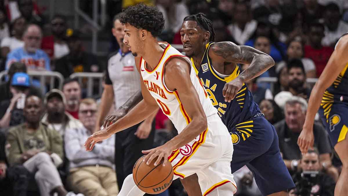 Atlanta Hawks forward Zaccharie Risacher (10) in action against the Indiana Pacers during the second half at State Farm Arena.