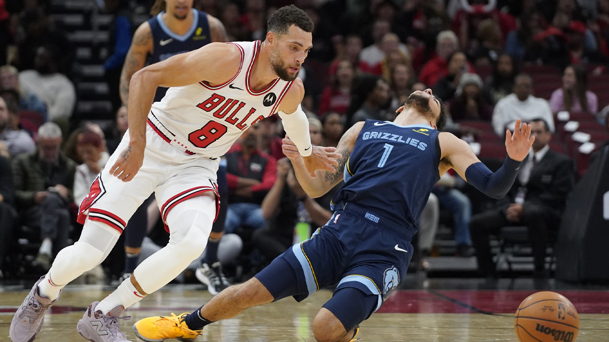 Chicago Bulls guard Zach LaVine (8) drives past Memphis Grizzlies guard Scotty Pippen Jr. (1) during the first half at United Center.