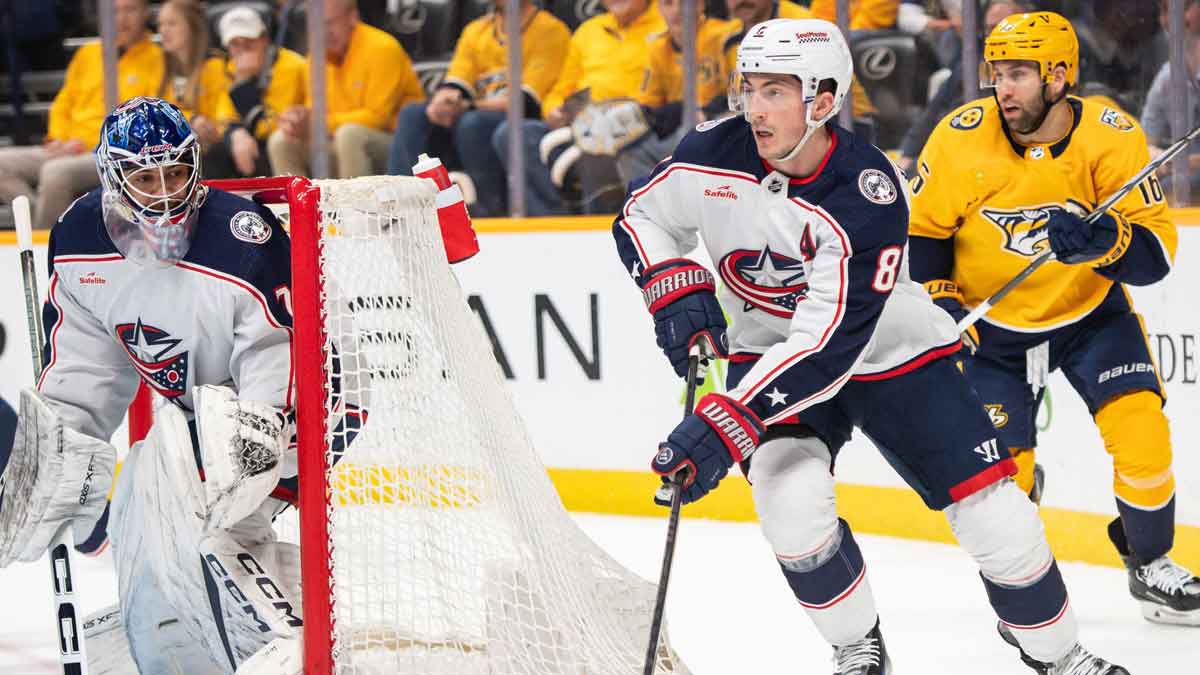 Columbus Blue Jackets defenseman Zach Werenski (8) skates against the Nashville Predators during the first period at Bridgestone Arena.
