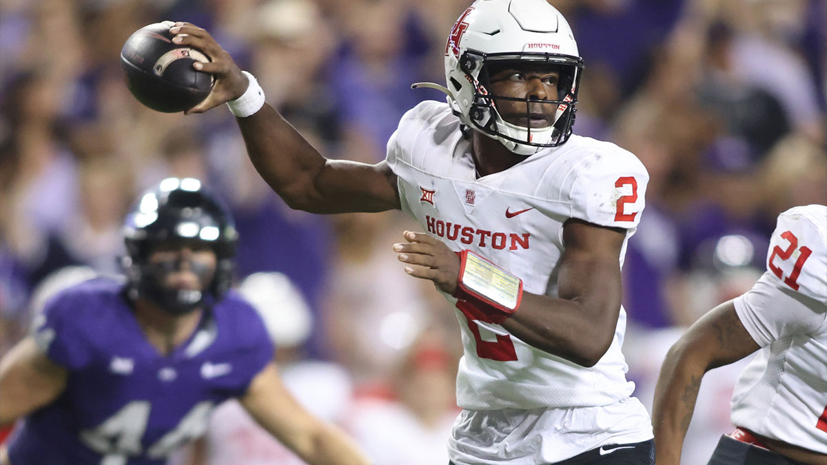 Oct 4, 2024; Fort Worth, Texas, USA; Houston Cougars quarterback Zeon Chriss (2) rolls out to pass in the third quarter against the TCU Horned Frogs at Amon G. Carter Stadium.
