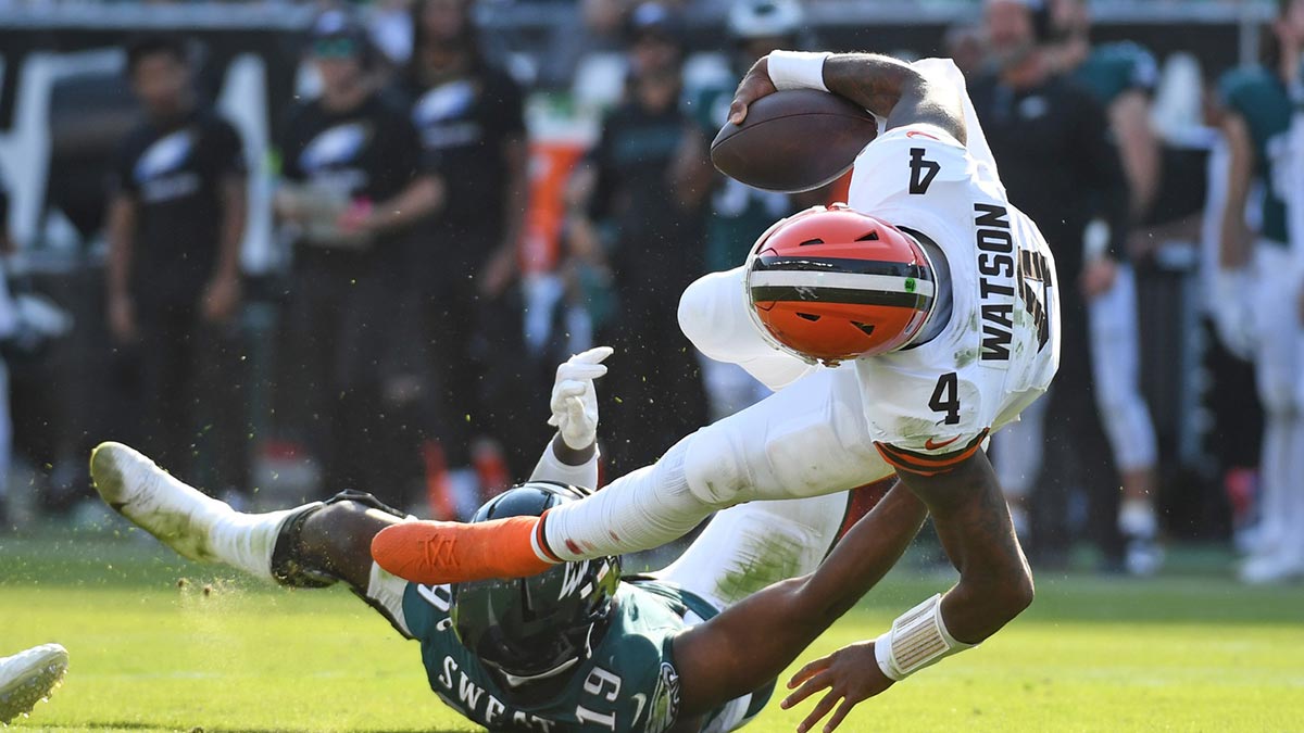 Cleveland Browns quarterback Deshaun Watson (4) is sacked by Philadelphia Eagles linebacker Josh Sweat (19) during the fourth quarter at Lincoln Financial Field.