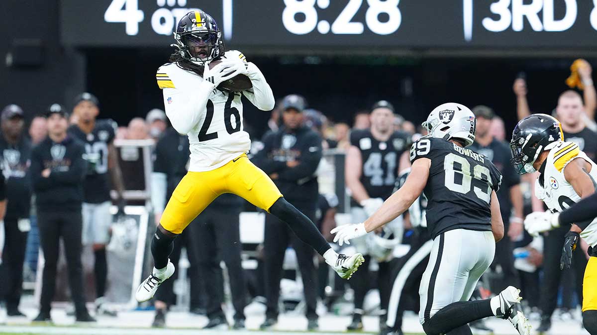 Steelers cornerback Donte Jackson (26) intercepts a pass intended for Las Vegas Raiders tight end Brock Bowers (89) during the fourth quarter at Allegiant Stadium.