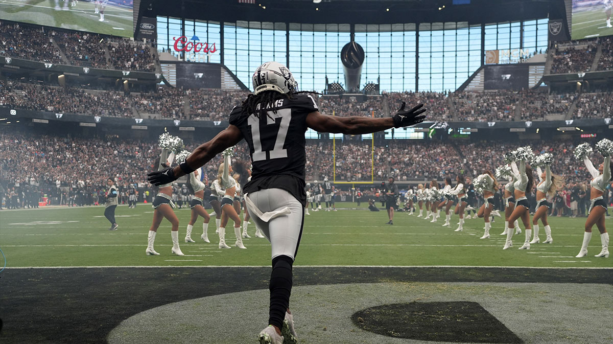 Las Vegas Raiders wide receiver Davante Adams (17) enters the field before the game against the Carolina Panthers at Allegiant Stadium.