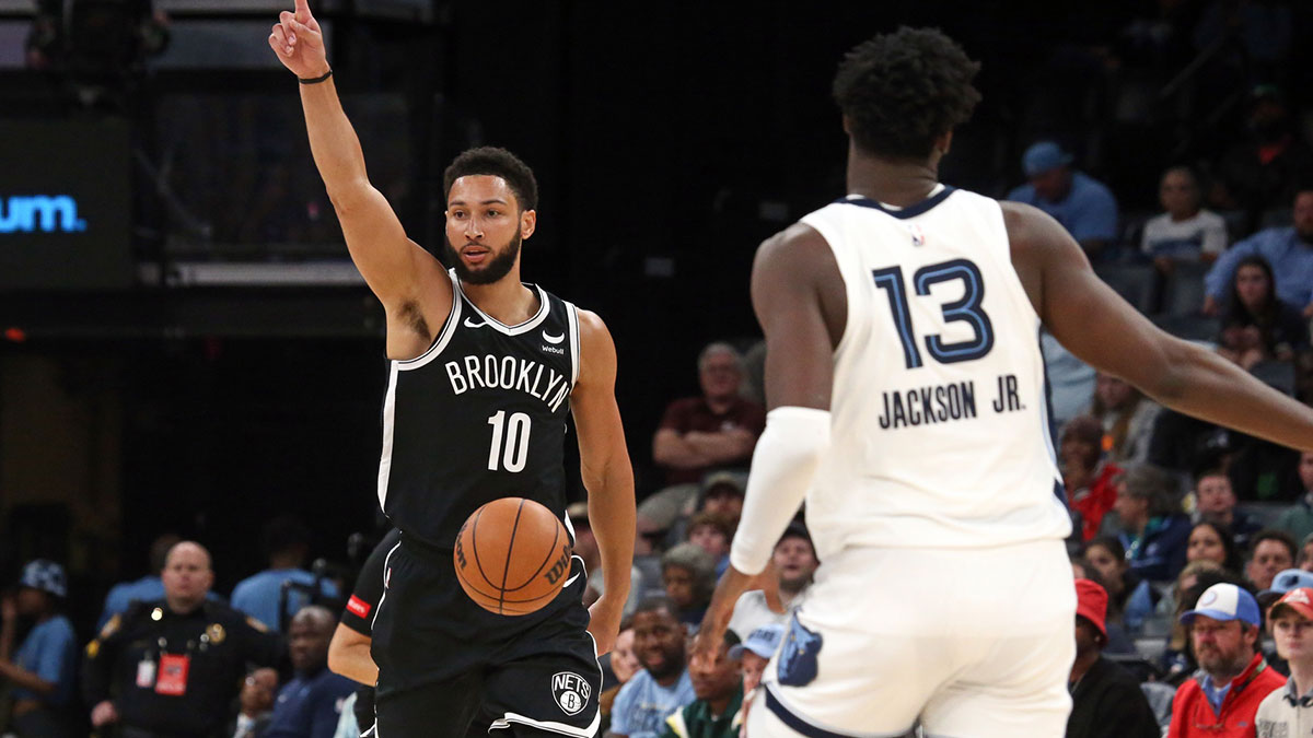 Brooklyn Nets guard Ben Simmons (10) gives direction as he brings the ball up the court during the second half against the Memphis Grizzlies at FedExForum.