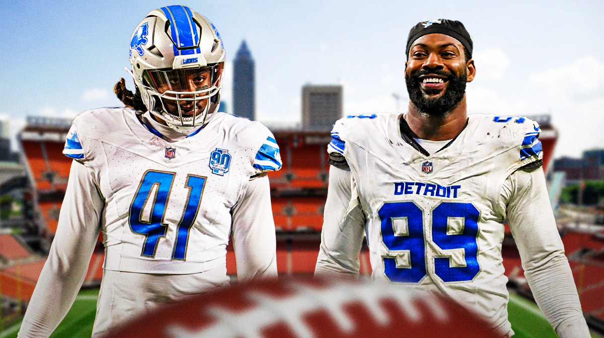 James Houston next to Za'Darius Smith in front of the Browns Stadium