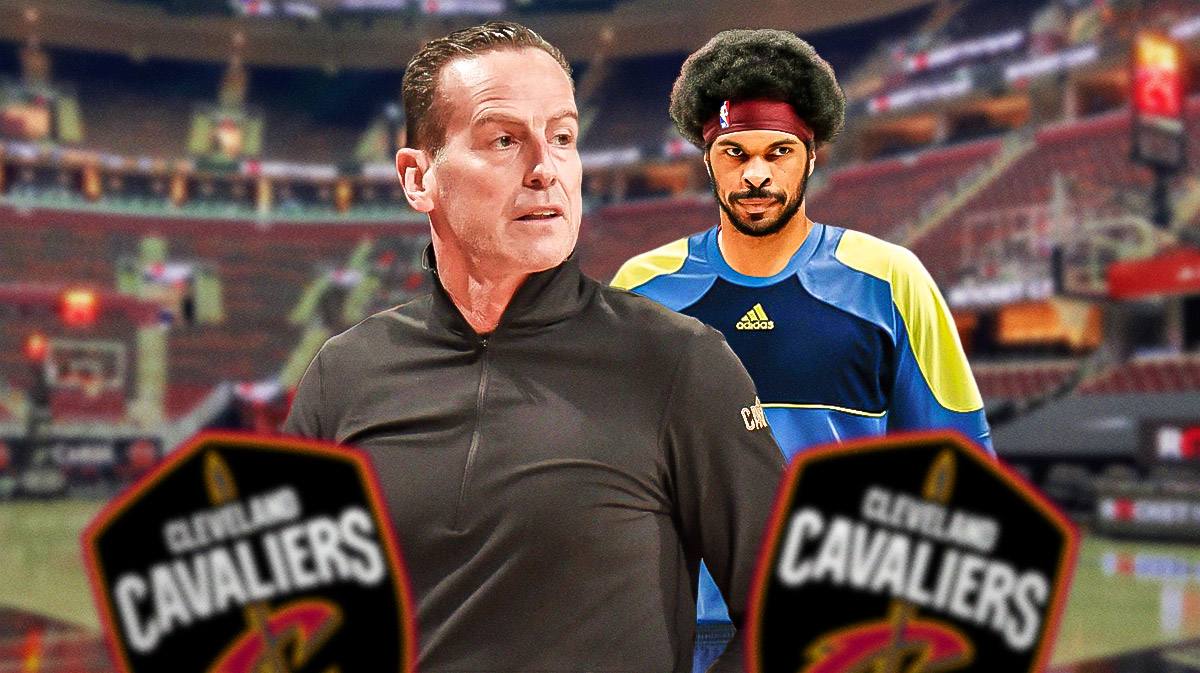 Kenny Atkinson next to Jarrett Allen (who is dressed as a soccer goalie).