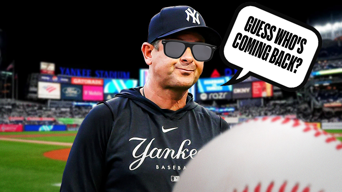 Yankees manager Aaron Boone with his sun glasses on saying "Guess who's coming back?"