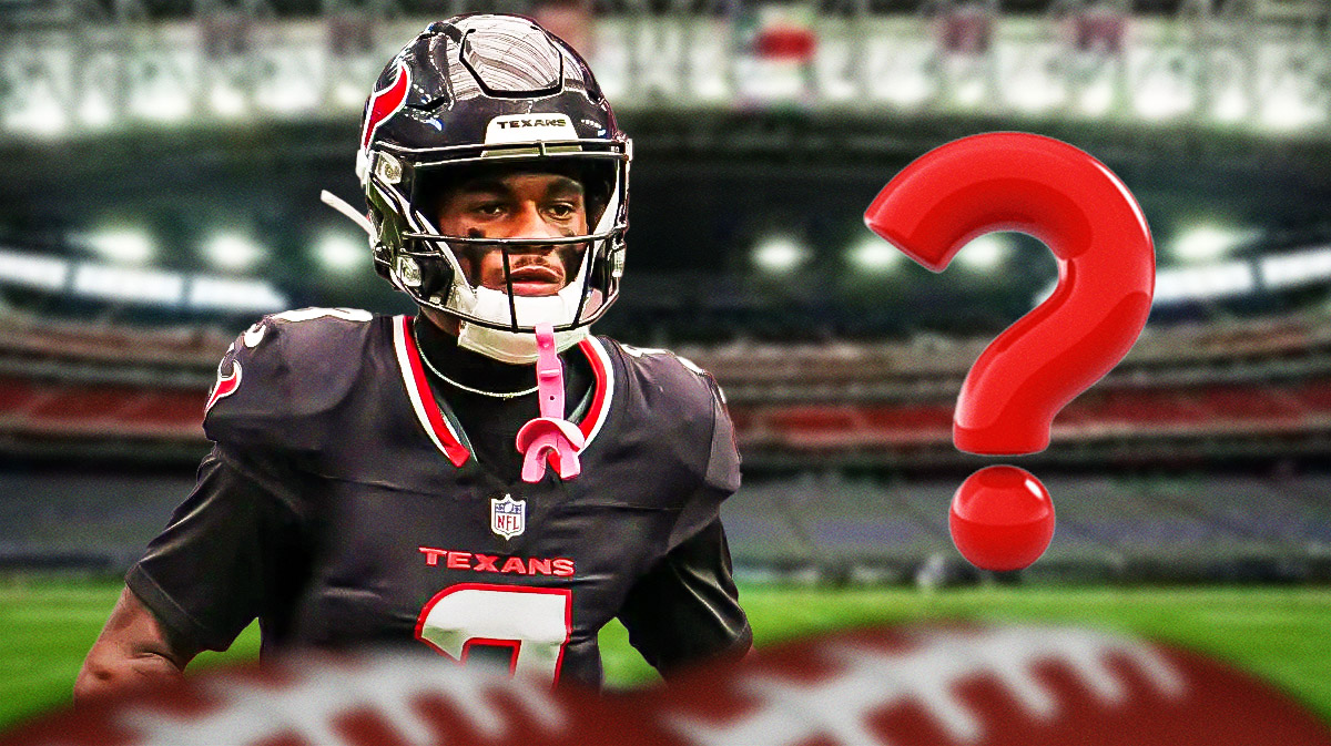 Texans' Tank Dell with big question mark next to him, NRG Stadium in back