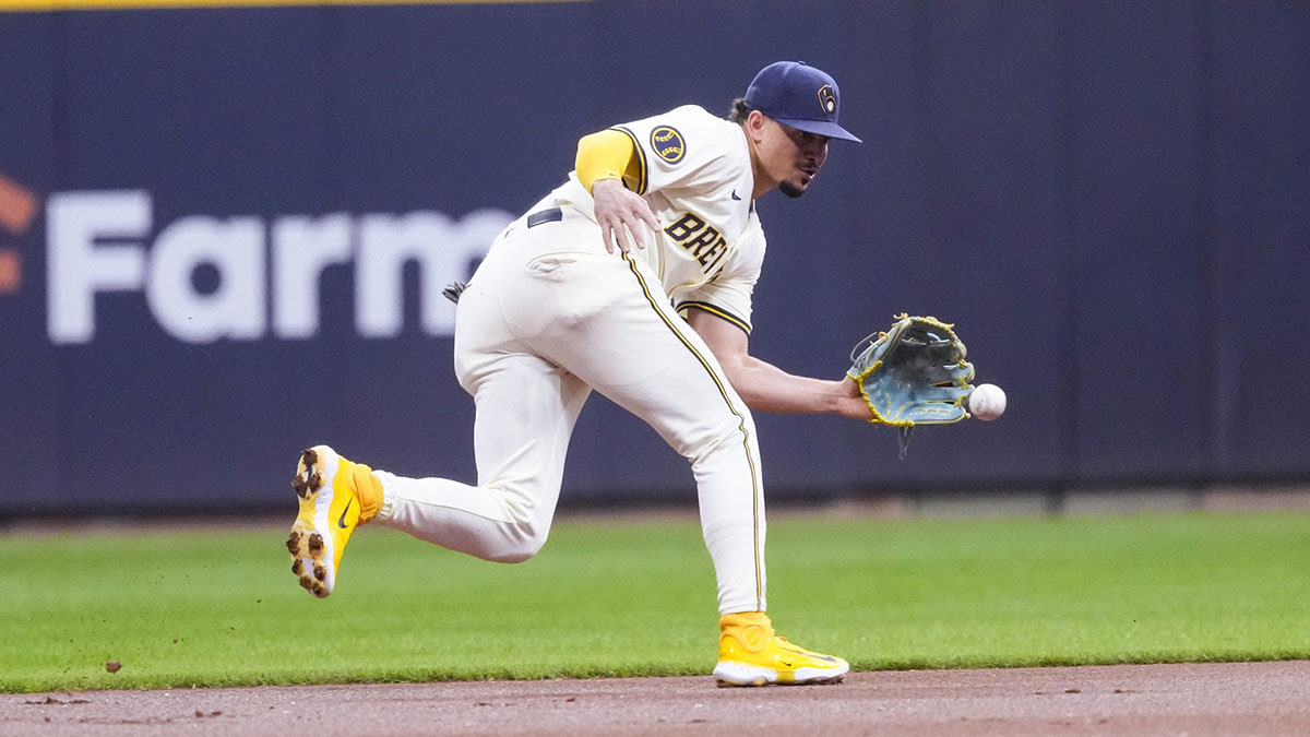 Milwaukee Brewers shortstop Willy Adames (27) fields a ground ball during the first inning against the Philadelphia Phillies at American Family Field. 