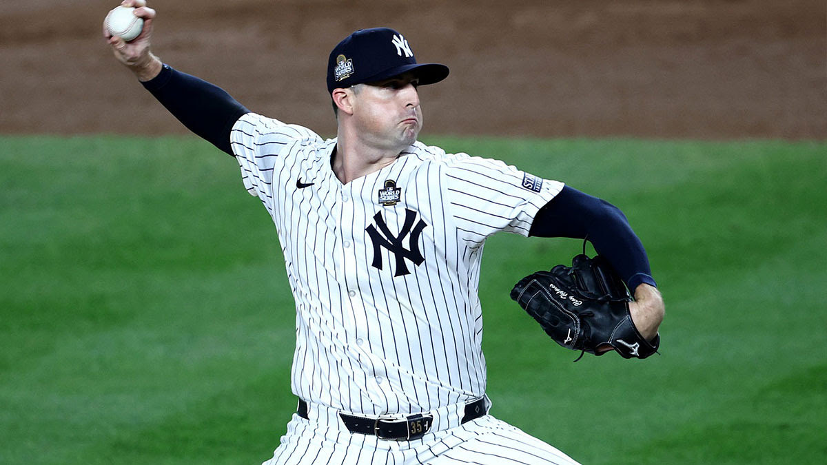 New York Yankees pitcher Clay Holmes (35) throws during the seventh inning against the Los Angeles Dodgers in game five of the 2024 MLB World Series at Yankee Stadium.