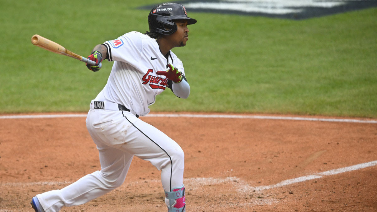 Cleveland Guardians third base Jose Ramirez (11) hits a single in the seventh inning against the Detroit Tigers during game five of the ALDS for the 2024 MLB Playoffs at Progressive Field.