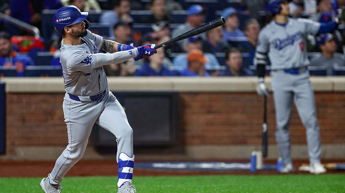 Los Angeles Dodgers center fielder Andy Pages (44) hits a solo home run during the fourth inning against the New York Mets during game five of the NLCS for the 2024 MLB playoffs at Citi Field.