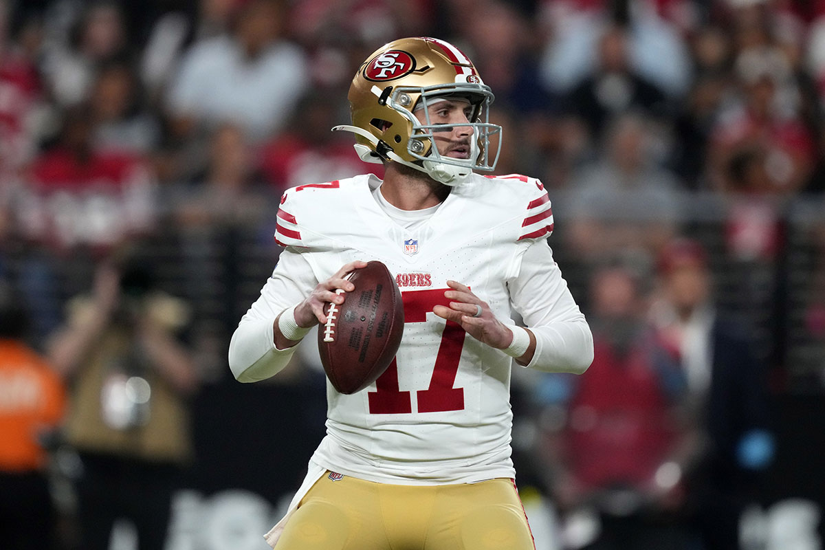 San Francisco 49ers quarterback Brandon Allen (17) throws the ball against the Las Vegas Raiders in the first half at Allegiant Stadium.