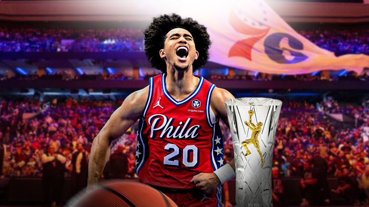 76ers' Jared McCain hyped up, with Rookie of the Year award beside him