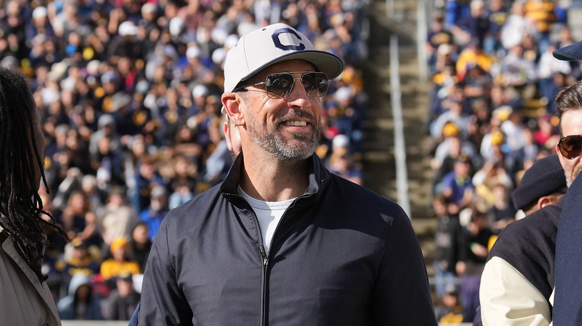 Golden Bears former quarterback Aaron Rodgers stands on the field before the start of the second quarter against the Stanford Cardinal at California Memorial Stadium.