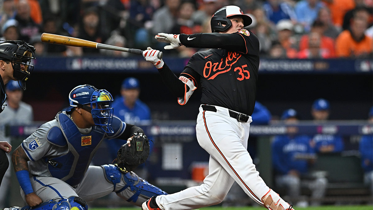 Baltimore Orioles catcher Adley Rutschman (35) hits a single against the Kansas City Royals in the fourth inning in game two of the Wild Card round for the 2024 MLB Playoffs at Oriole Park at Camden Yards