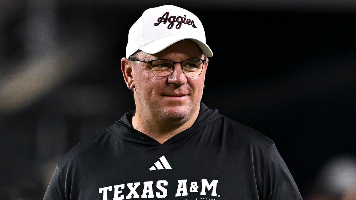Texas A&M Aggies head coach Mike Elko walks on the field prior to the game against the New Mexico State Aggies at Kyle Field.