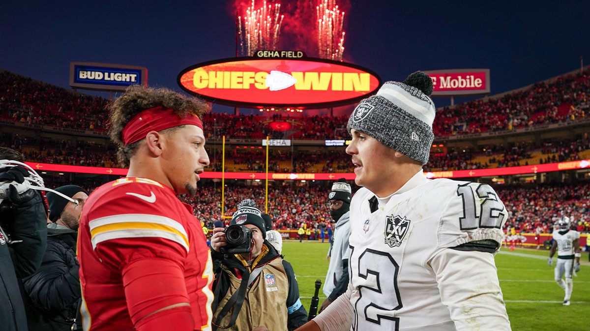 Kansas City Chiefs quarterback Patrick Mahomes (15) shakes hands with Las Vegas Raiders quarterback Aidan O'Connell (12) after the game at GEHA Field at Arrowhead Stadium.