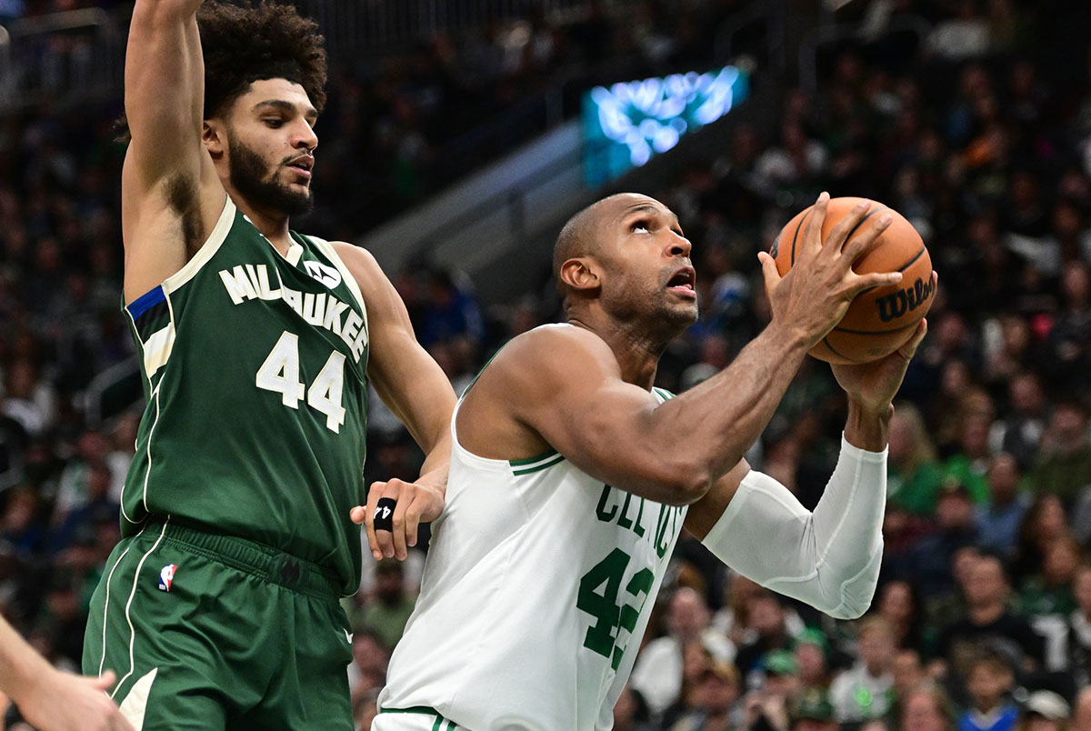 Boston Celtictics Center Al Horford (42) is shooting against Milvaukee Buck Next Andre Jackson Jr. (44) In the fourth quarter at Fiserv Forum.