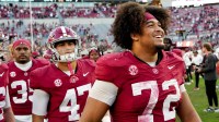 Alabama Crimson Tide offensive lineman Parker Brailsford (72) has a big smile as he leaves the field at Bryant-Denny Stadium. Alabama defeated Mercer 52-7.
