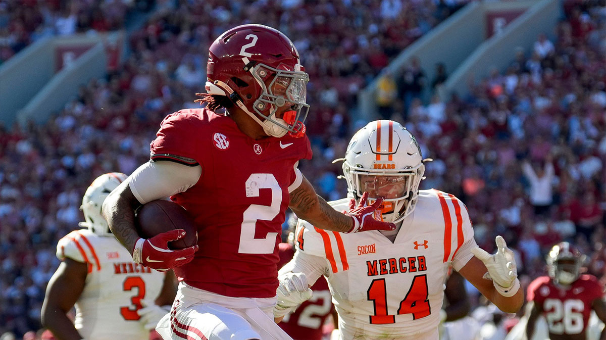 Alabama Crimson Tide wide receiver Ryan Williams (2) passes Mercer safety Chris Joines (14) as he scores at Bryant-Denny Stadium.