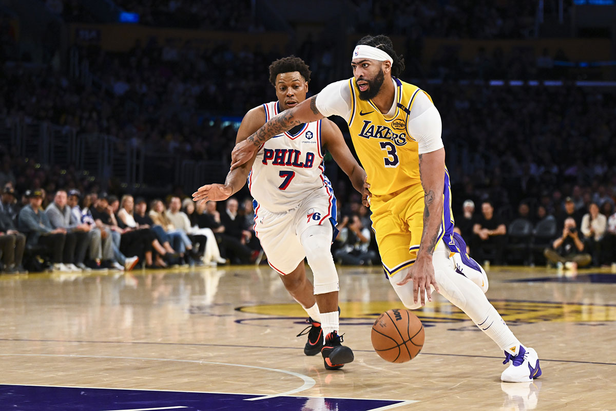  Los Angeles Lakers forward Anthony Davis (3) drives against Philadelphia 76ers guard Kyle Lowry (7) during the second half at Crypto.com Arena.