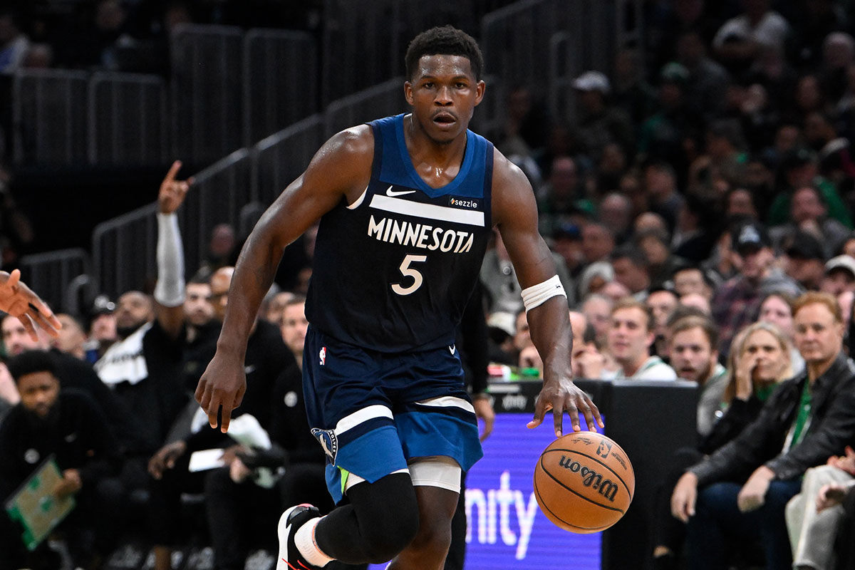 Minnesota Timberwolves guard Anthony Edwards (5) dribbles against the Boston Celtics during the second half at TD Garden.
