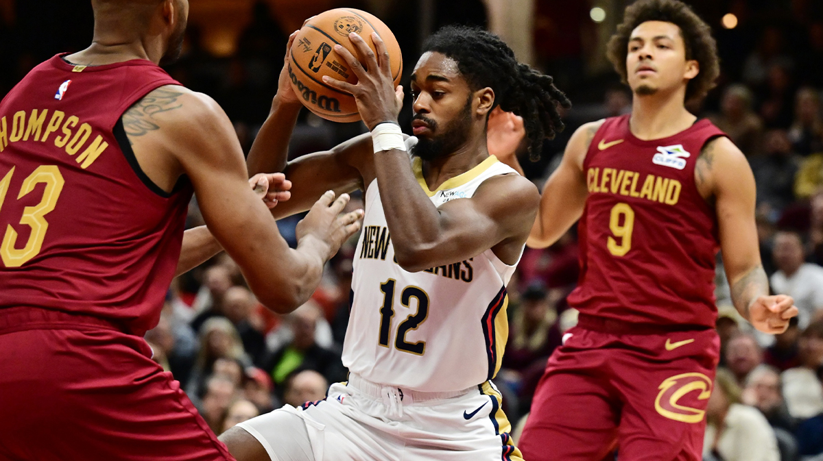 New Orleans Pelicans guard Antonio Reeves (12) drives to the basket against Cleveland Cavaliers center Tristan Thompson (13) during the second half at Rocket Mortgage FieldHouse.