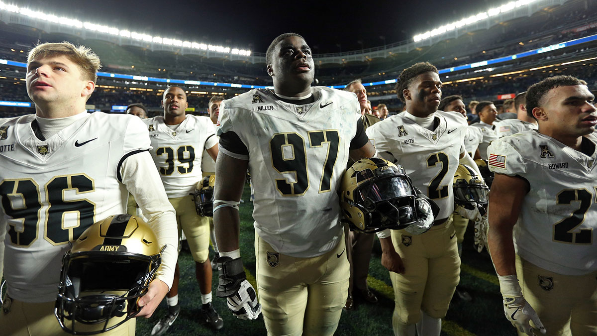 Army Black Knights defensive lineman Dre Miller (97) sings the West Point alma mater after a win against the Notre Dame Fighting Irish at Yankee Stadium