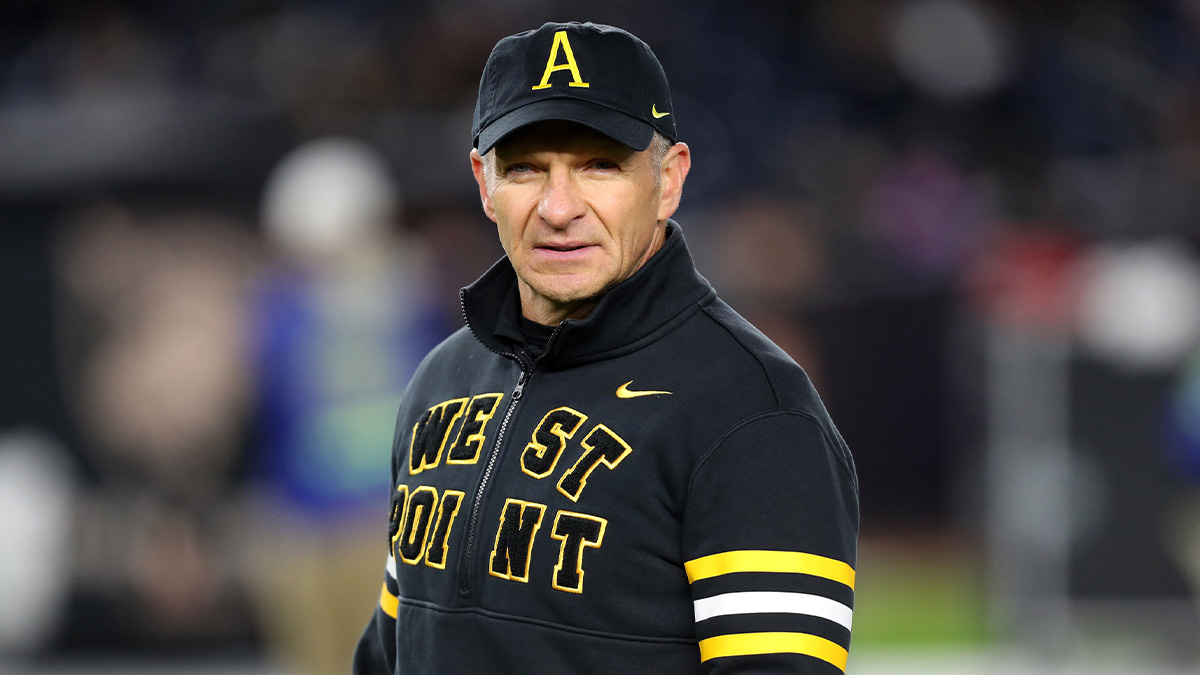 Army Black Knights head coach Jeff Monken watches his players warm up before the first half against the Notre Dame Fighting Irish at Yankee Stadium