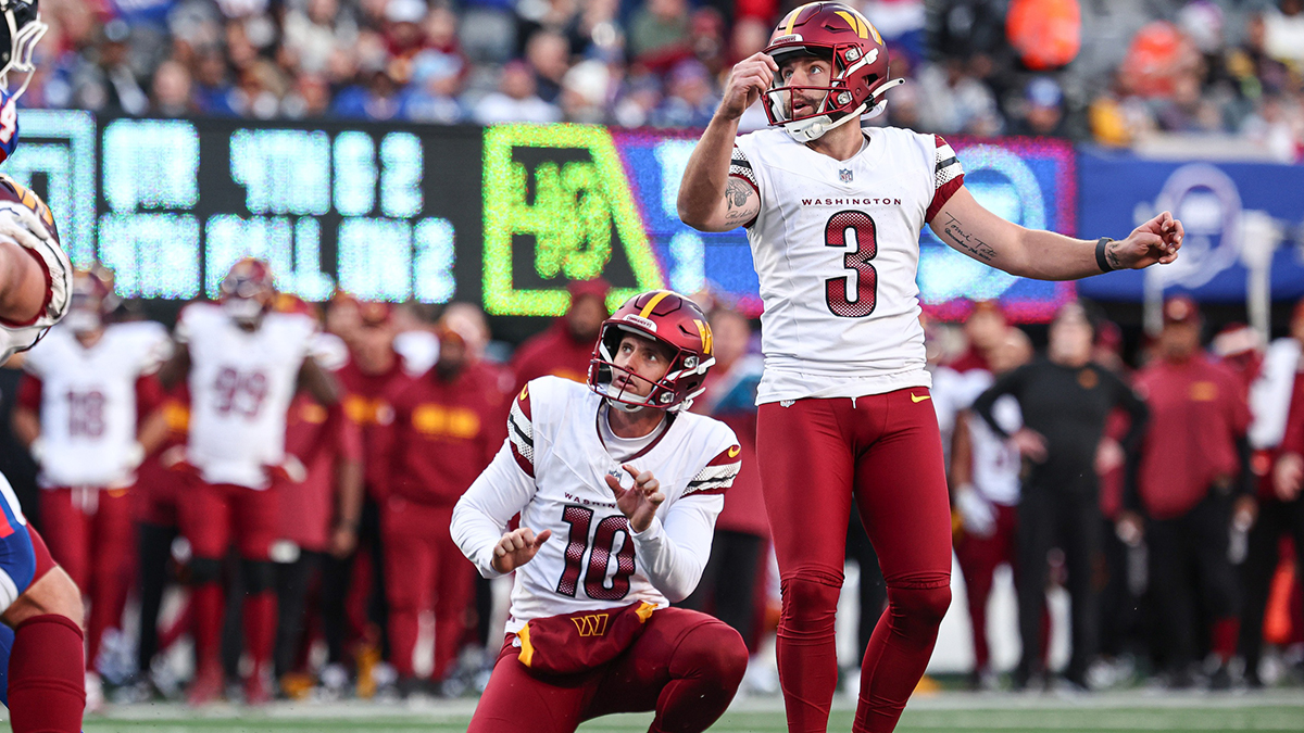 Washington Commanders place kicker Austin Seibert (3) looks up after kicking a field goal during the second half against the New York Giants at MetLife Stadium.