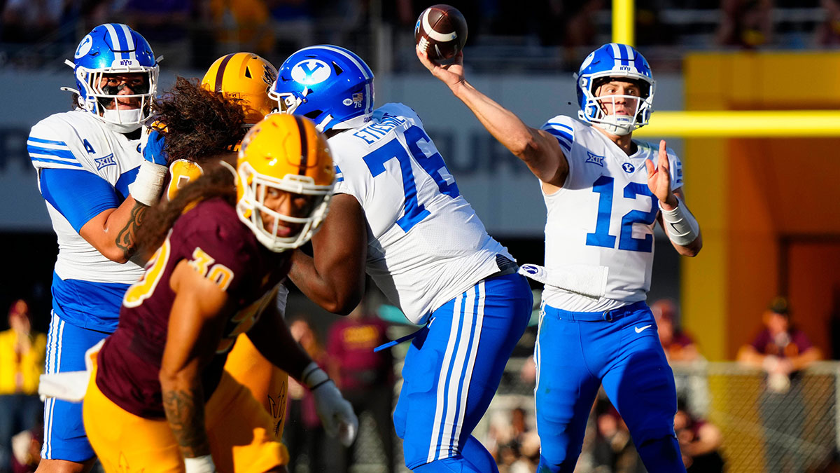 BYU quarterback Jake Retzlaff (12) throws a pass against Arizona State during the second half at Mountain America Stadium in Tempe