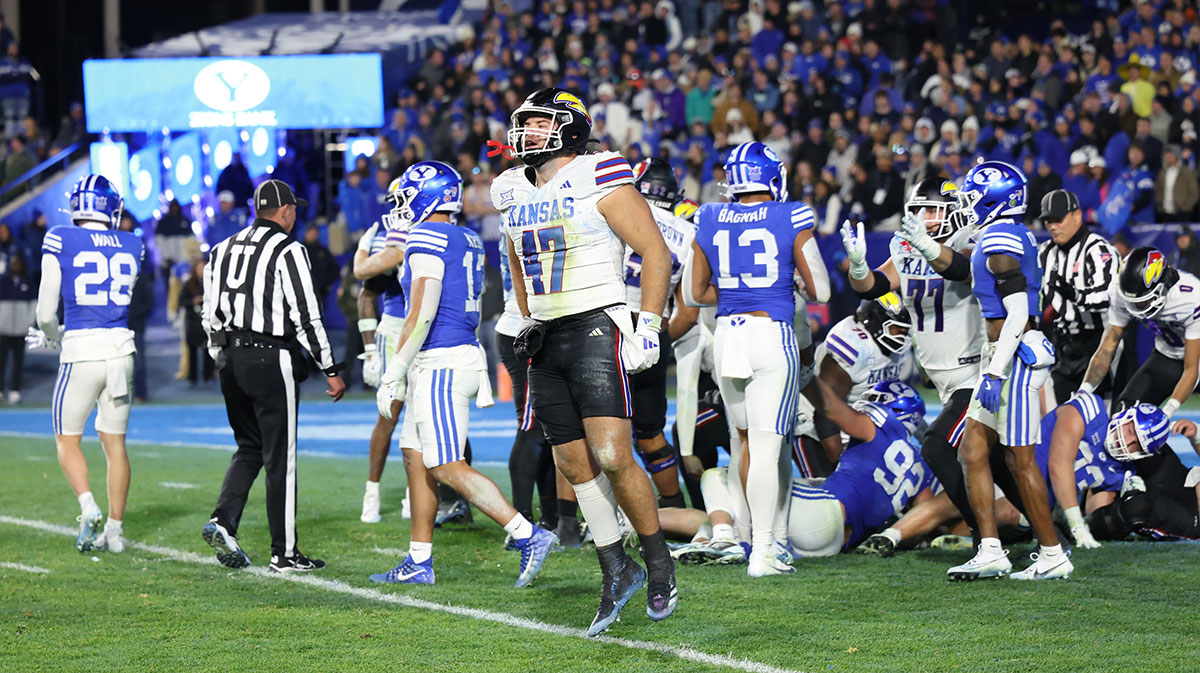Kansas Jayhawks cornerback Jacoby Davis (47) celebrates a win over the Brigham Young Cougars after the last play of the fourth quarter at LaVell Edwards Stadium.