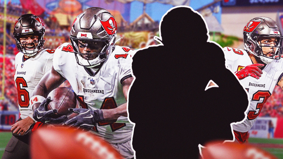 Baker Mayfield, Mike Evans, Chris Godwin, and the blacked-out silhouette of Cade Otton in front of the Buccaneers Stadium