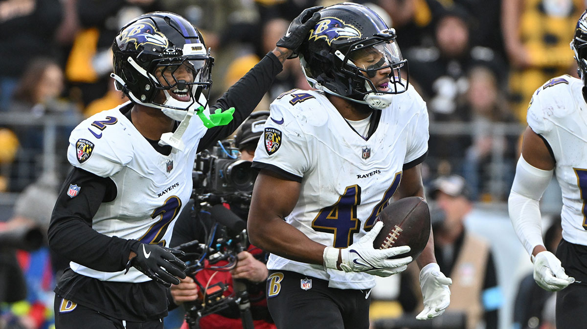 Baltimore Ravens cornerback Marlon Humphrey (44) celebrates with Nate Wiggins (2) after ntercepting a pass in the end zone against the Pittsburgh Steelers during the fourth quarter at Acrisure Stadium.