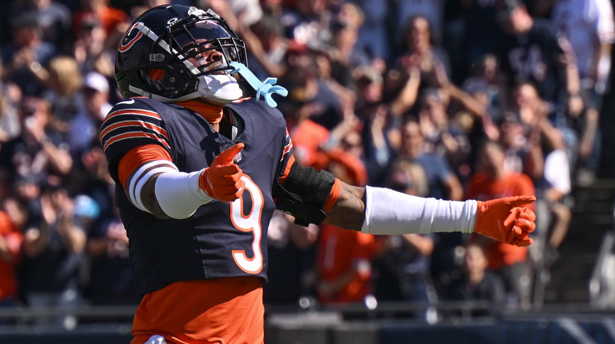 Chicago Bears safety Jaquan Brisker (9) celebrates a defensive stop against the Carolina Panthers during the first quarter at Soldier Field.