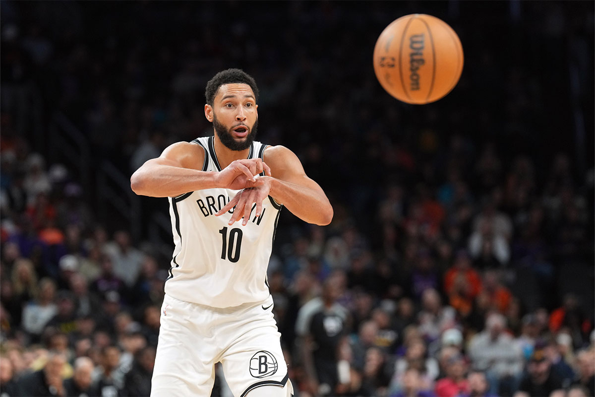 Brooklyn Nets guard Ben Simmons (10) passes the ball against the Phoenix Suns during the second half at Footprint Center.