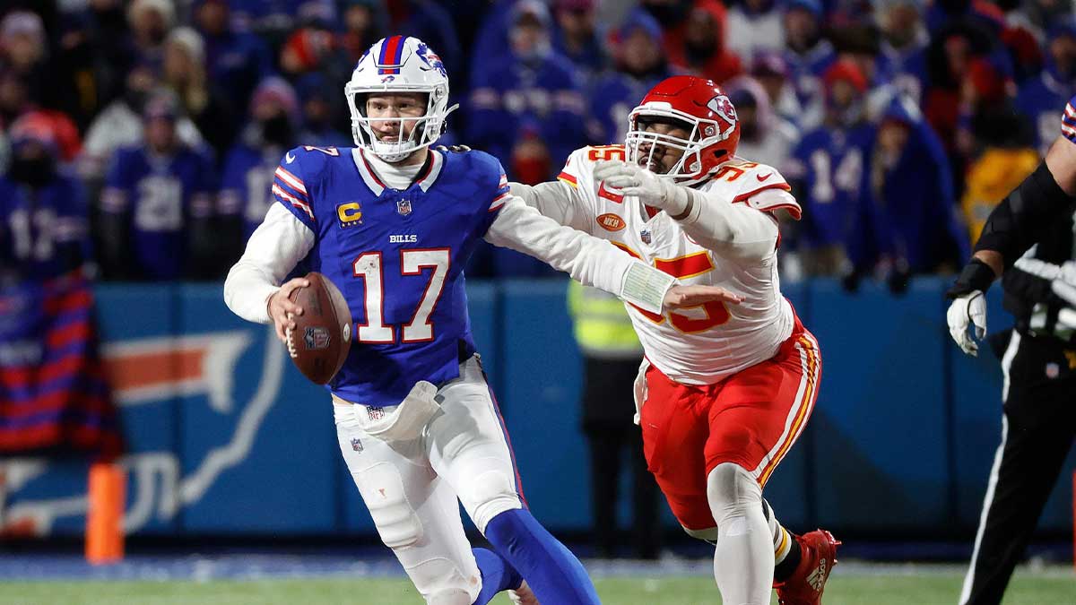 Buffalo Bills quarterback Josh Allen (17) is caught from behind by Kansas City Chiefs defensive tackle Chris Jones (95).