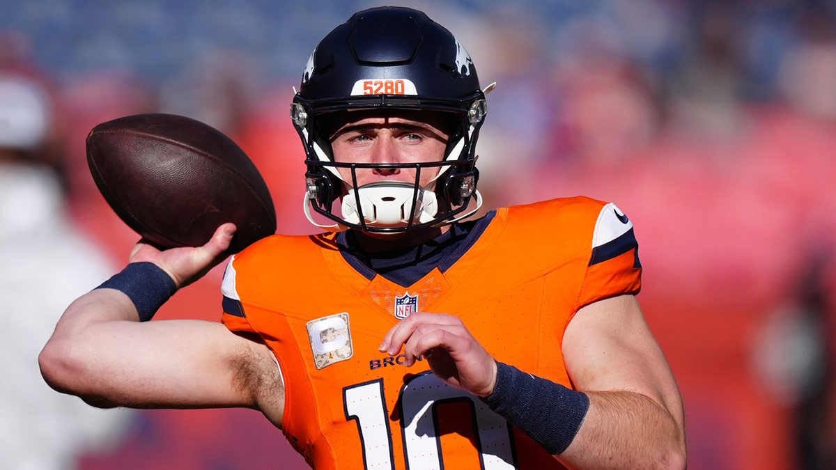 Denver Broncos quarterback Bo Nix (10) warms before the game against the Atlanta Falcons at Empower Field at Mile High