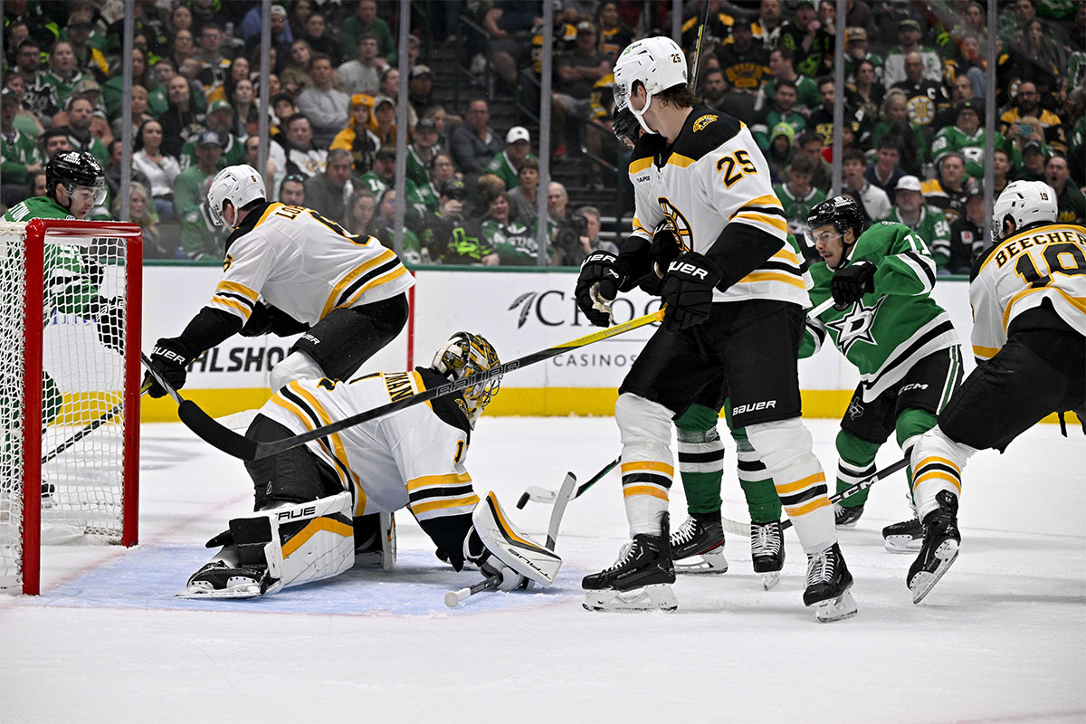 Dallas Stars center Logan Stankoven (11) scores a goal against Boston Bruins goaltender Jeremy Swayman (1) during the second period at the American Airlines Center.